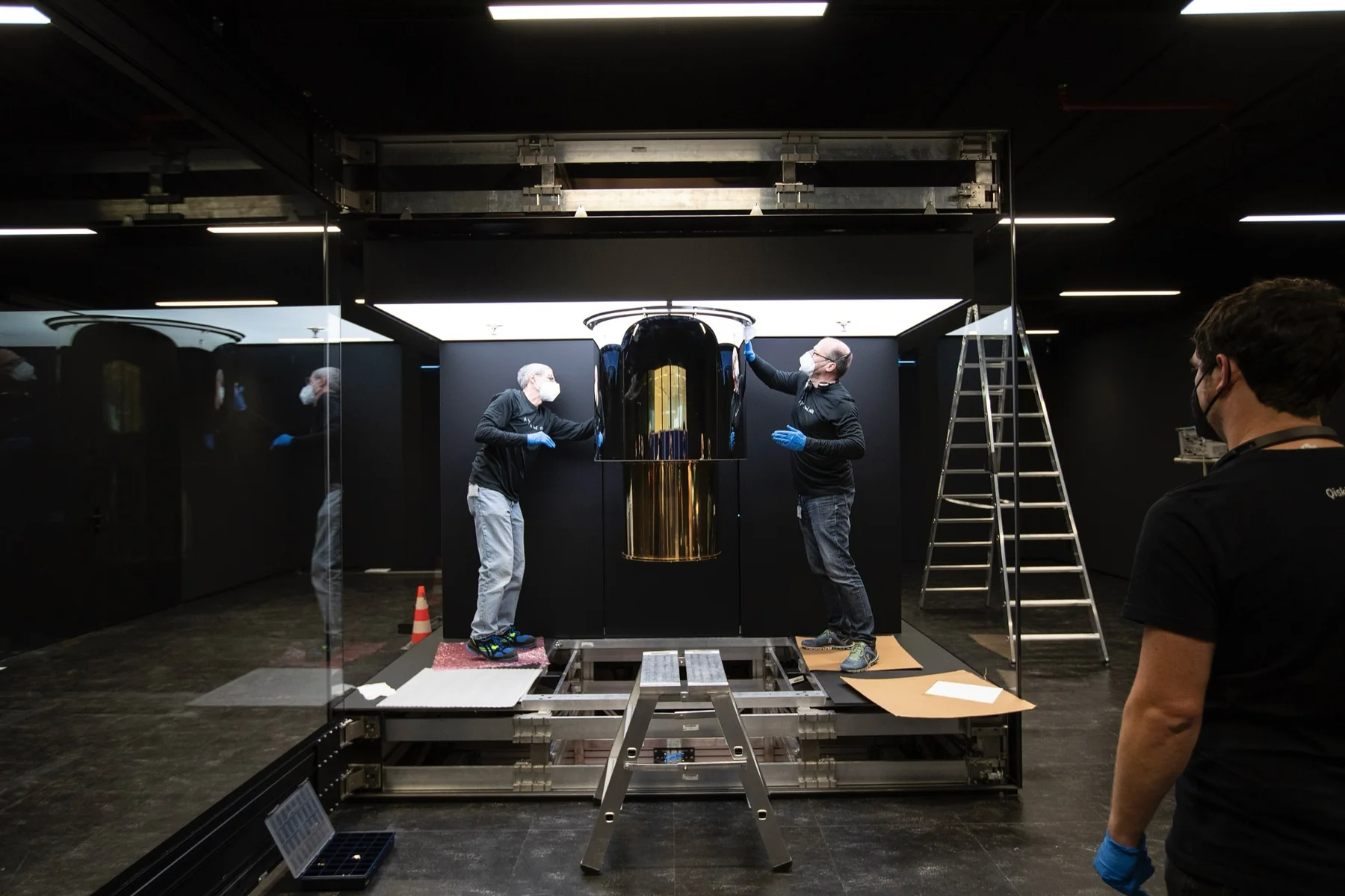 Engineers installing a quantum computer